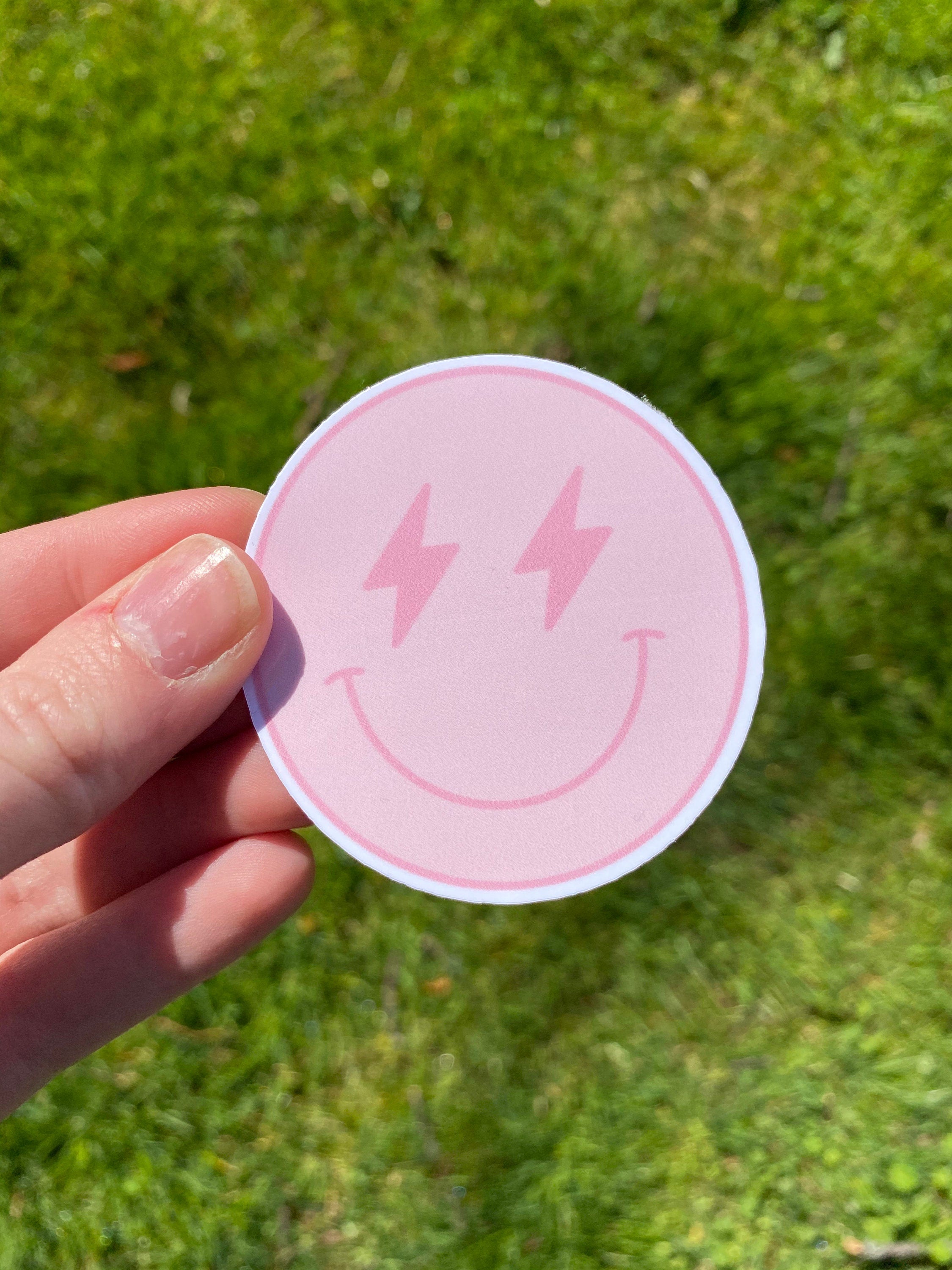 Lighting bolt smiley face sticker