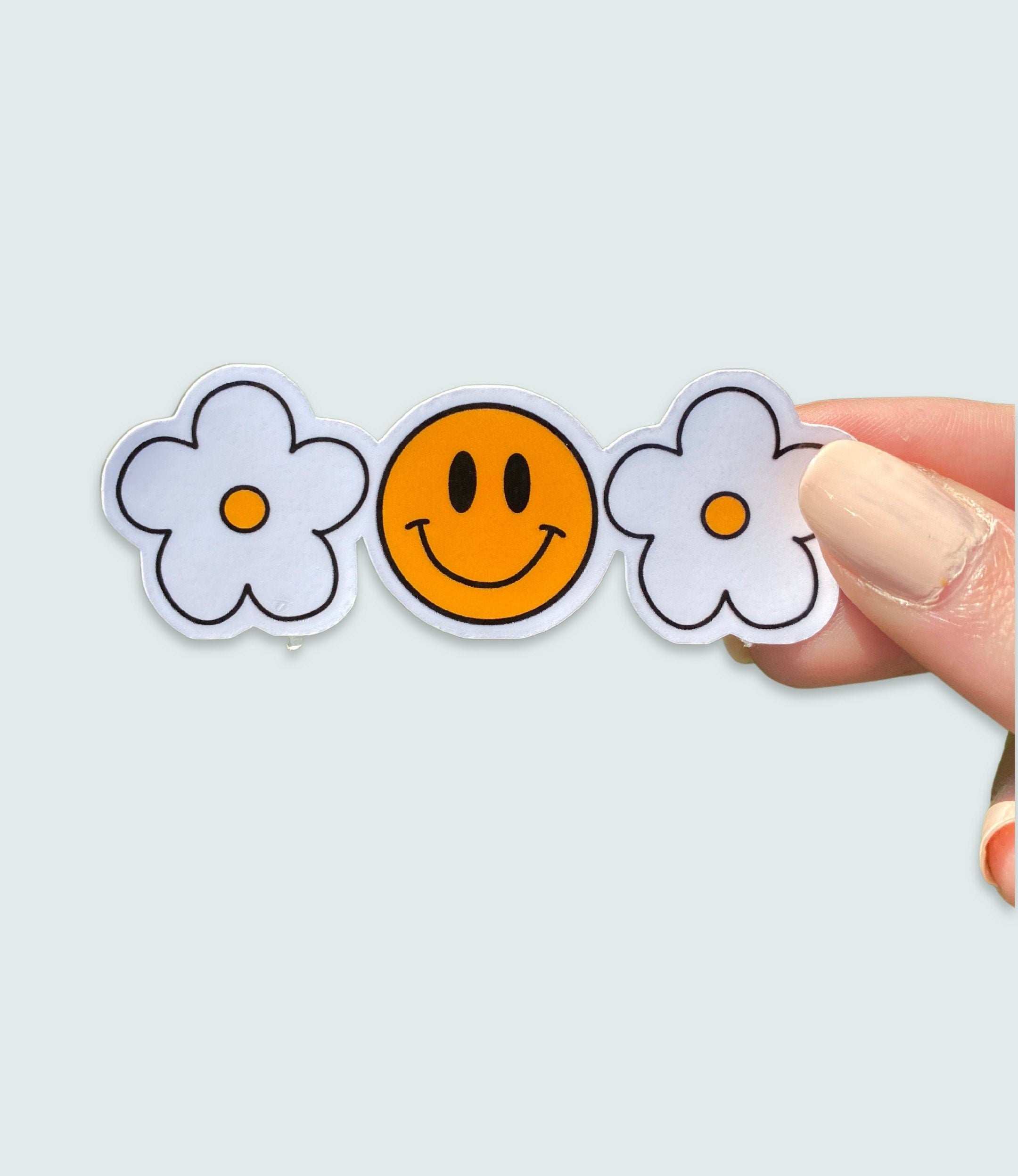 Smiley face flower sticker